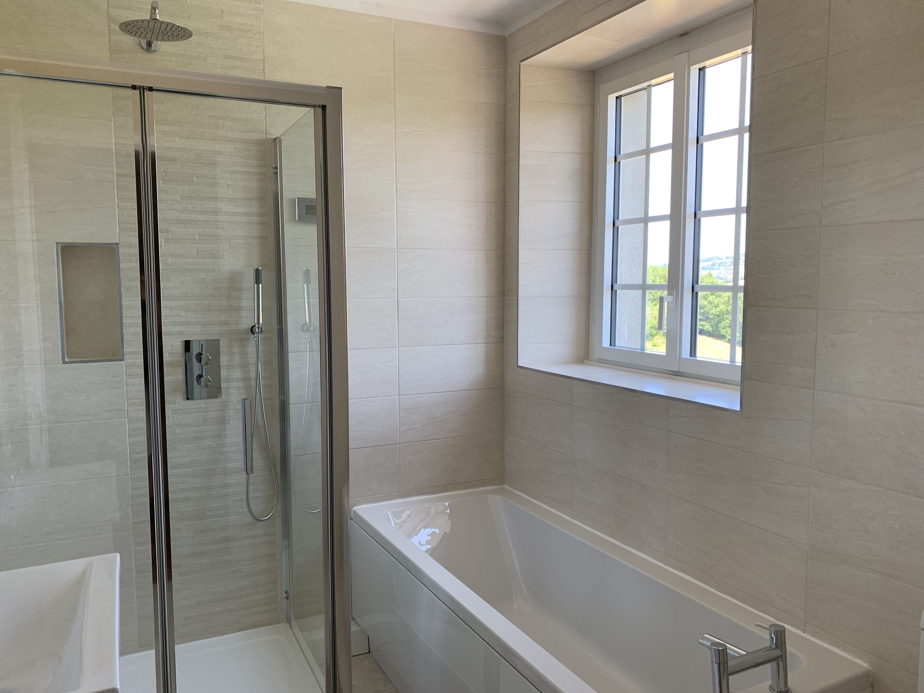 Bathtub, hair dryer, towels, soap