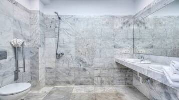 Combined shower/tub, hair dryer, towels, soap