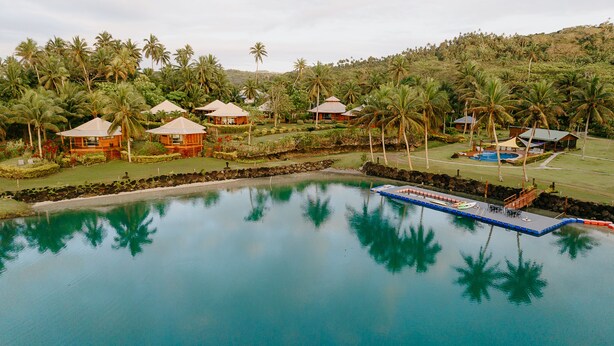 A resort with a large pool, multiple bungalow-style accommodations, and a lush tropical setting. - La Dolce Vita Holiday Villas (Savusavu)