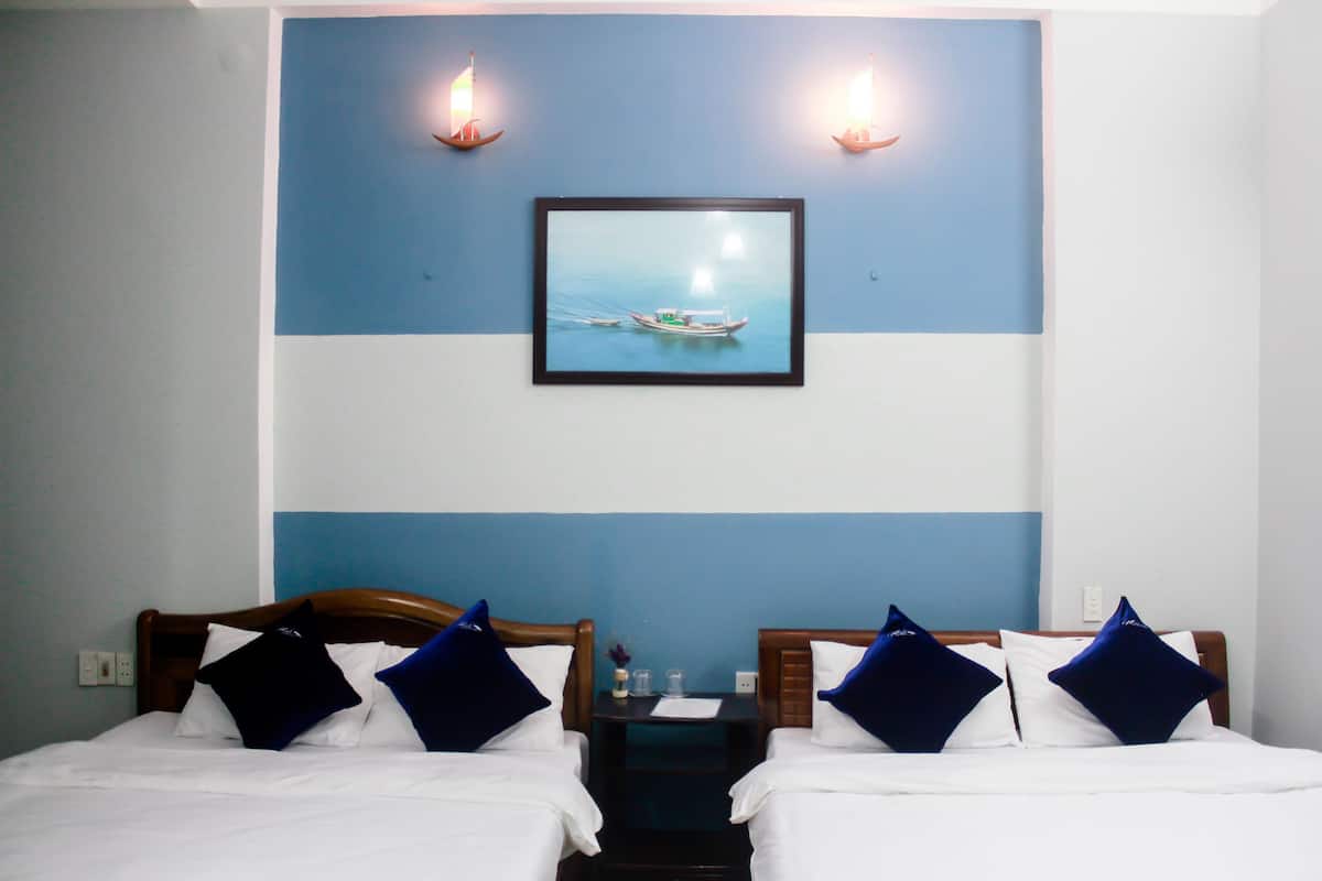 Habitación familiar | Escritorio, wifi gratis, ropa de cama