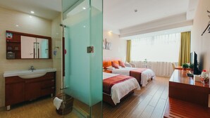 A hotel room with a bathroom, two beds, a desk, and a large window. - Xitang Hotel (Jiaxing)