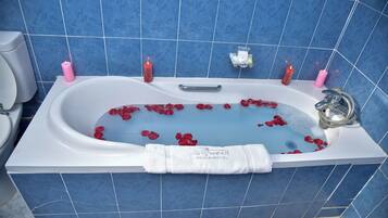 Separate tub and shower, deep soaking tub, rainfall showerhead