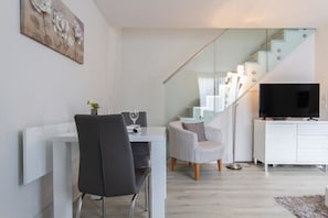 Business Apartment, 1 King Bed, Non Smoking | Living room | Flat-screen TV