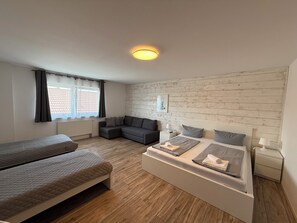 Comfort Quadruple Room, Non Smoking | Hypo-allergenic bedding, iron/ironing board, free WiFi, bed sheets