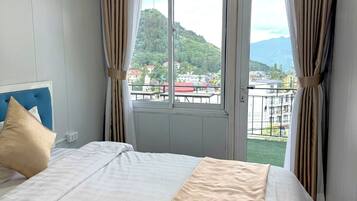 Deluxe Double Room, 1 Bedroom, Mountain View | Blackout drapes, soundproofing, WiFi (free), individually decorated