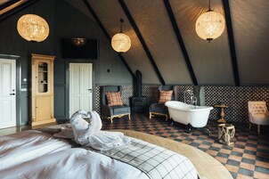 Suite, Balcony | Individually decorated, individually furnished, desk, blackout drapes