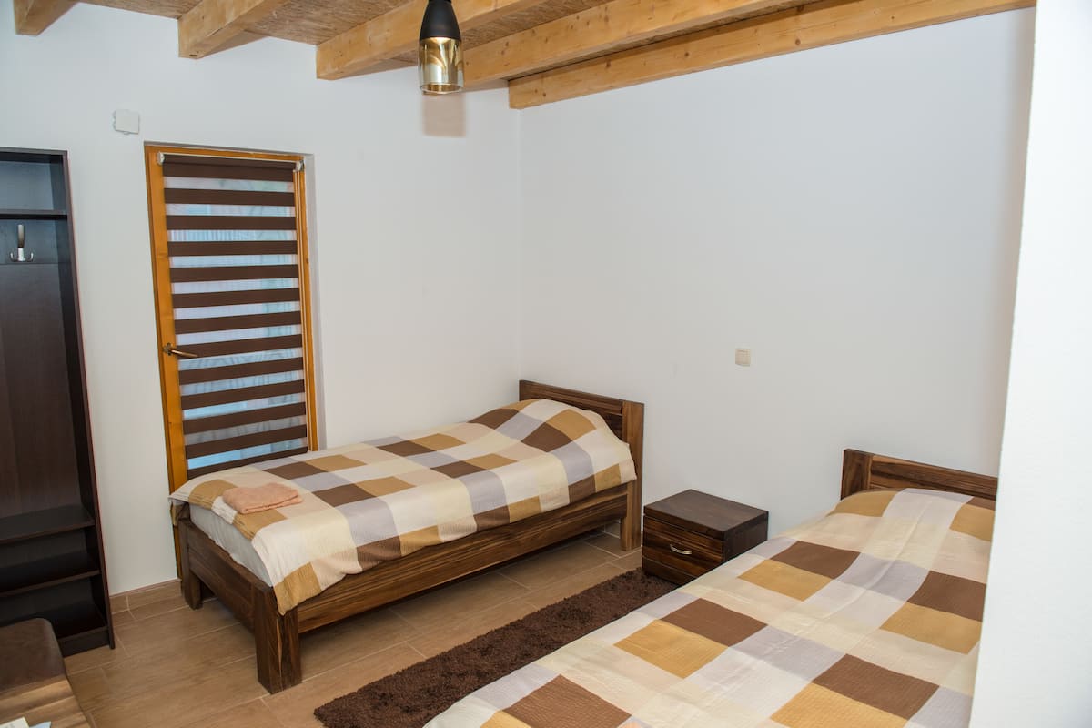 Standard Twin Room | In-room safe, iron/ironing board, free cribs/infant beds, free WiFi