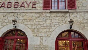 A stone building with a sign reading 'HOTEL DE ABBAYE.' - Hotel De L'Abbaye (Longpont)