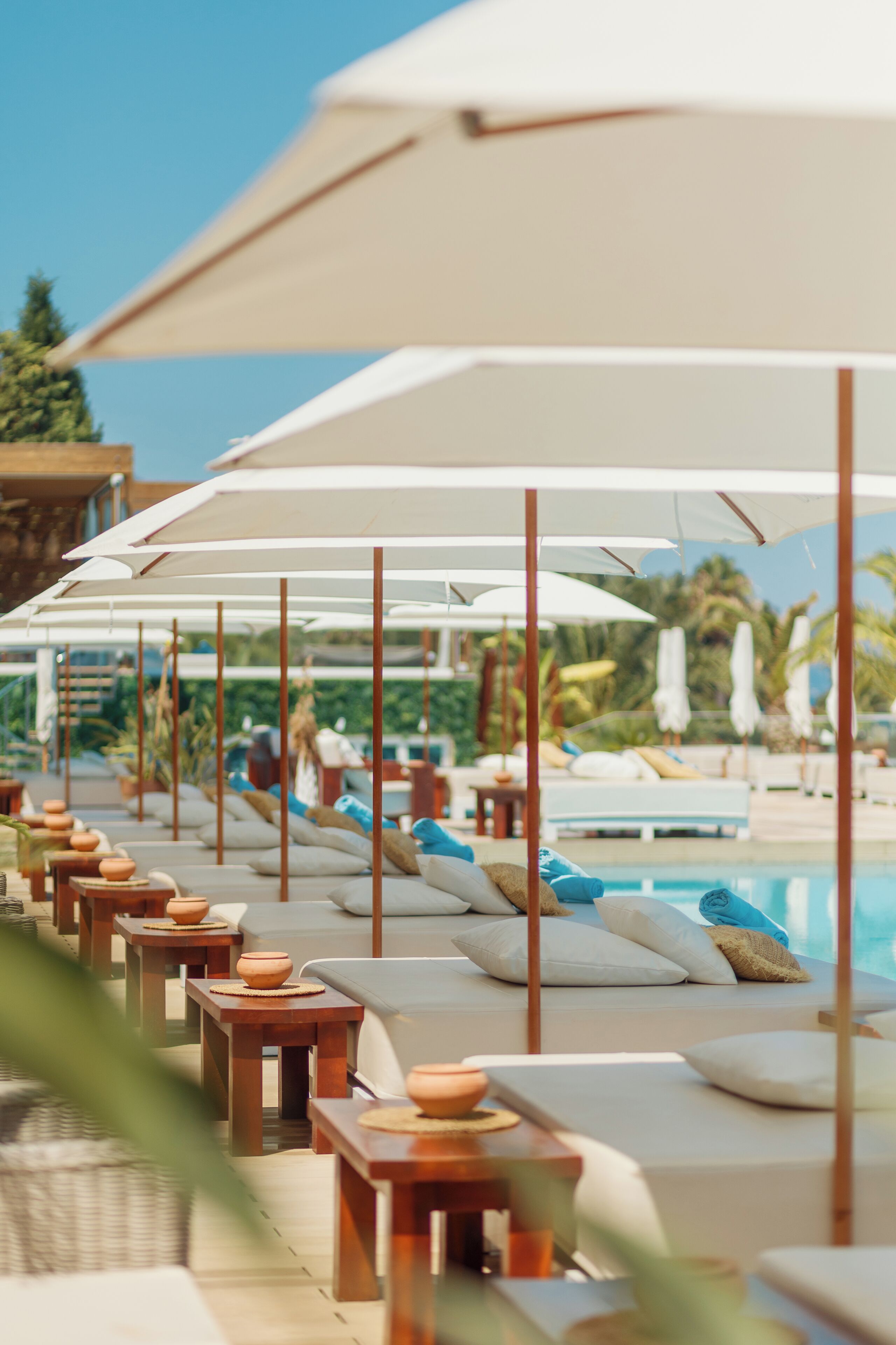 indoor pool, 3 outdoor pools, open 9:00 am to 8:00 pm, pool umbrellas