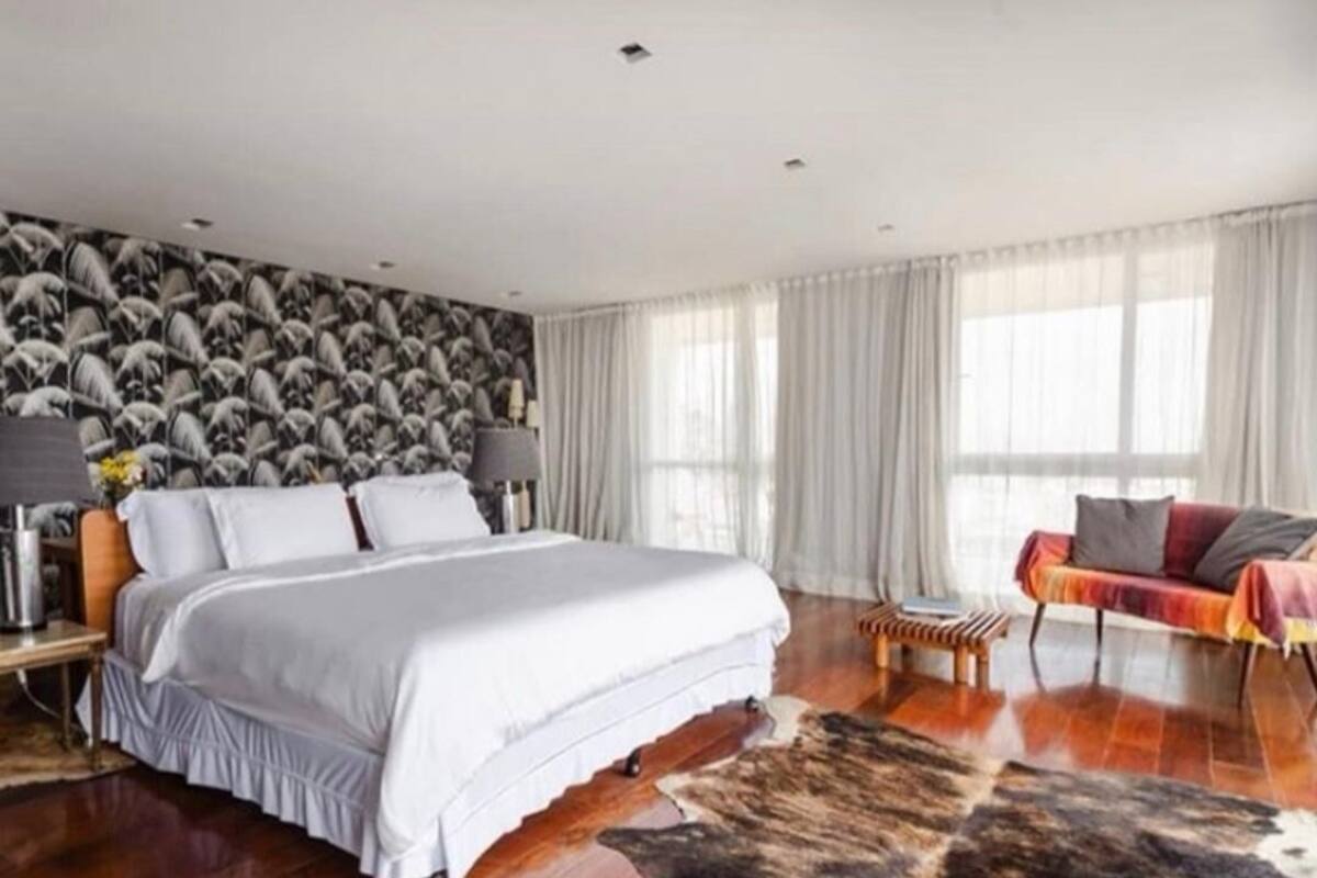 Suite de diseño, 1 cama de matrimonio, balcón, vistas al mar | Minibar, caja fuerte, escritorio y cortinas opacas