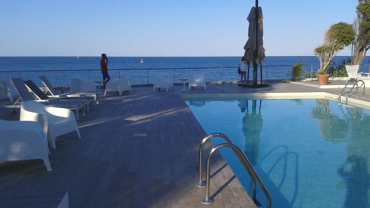 Outdoor pool, pool umbrellas, pool loungers