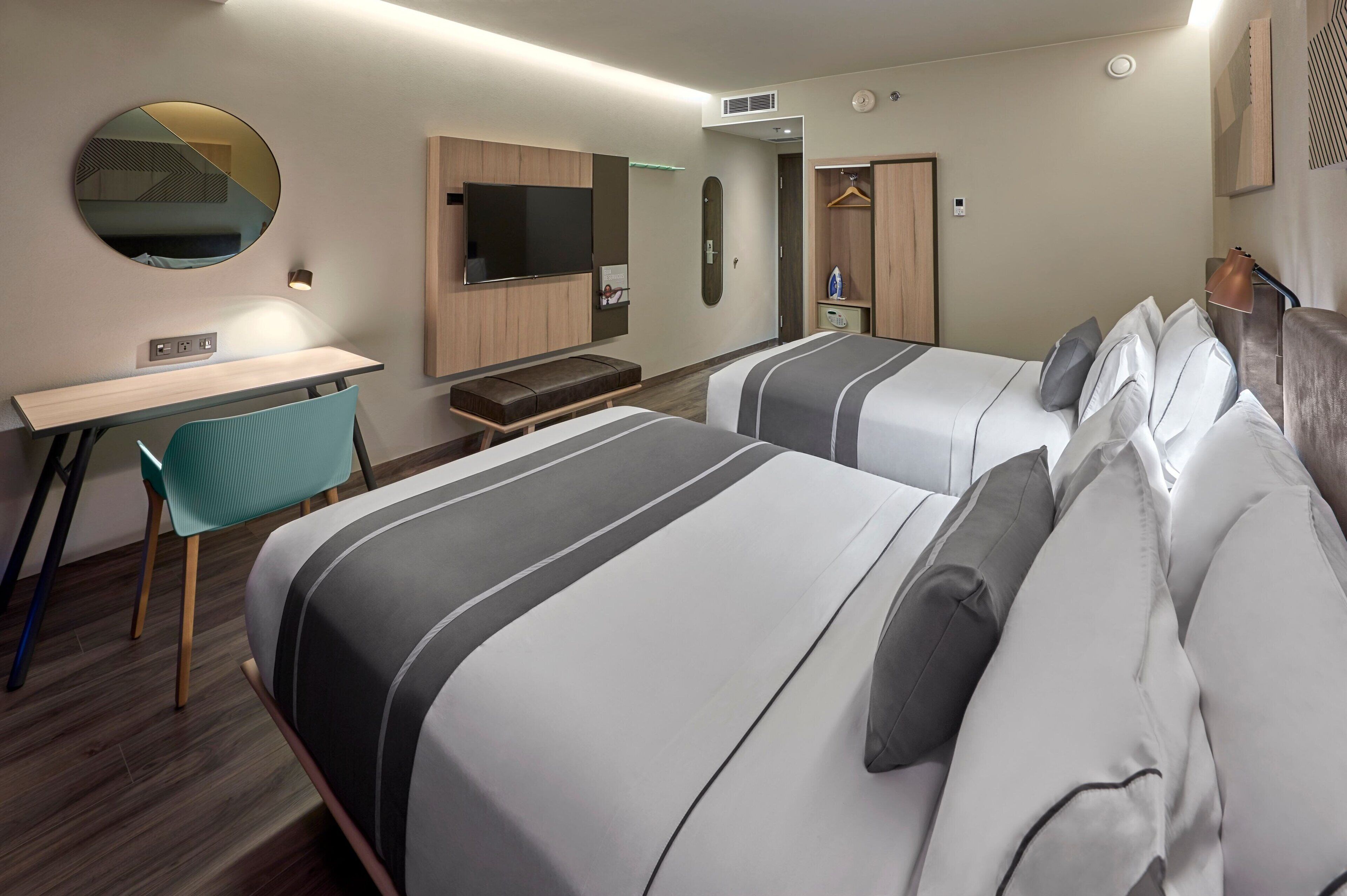 room, 2 double beds, non smoking | in-room safe, desk, iron/ironing board, free cots/infant beds