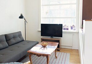 Apartment, 2 Bedrooms, Balcony (201) | Living room | Flat-screen TV - Brattagata Guesthouse Apartments (Reykjavik)