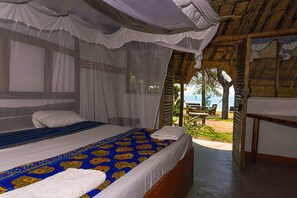 Deluxe Double Room, Lake View | Premium bedding, in-room safe, blackout drapes, bed sheets - Mgoza Lodge (Cape Maclear)