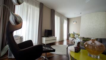Apartment, 1 Bedroom, Balcony | Living area | Flat-screen TV