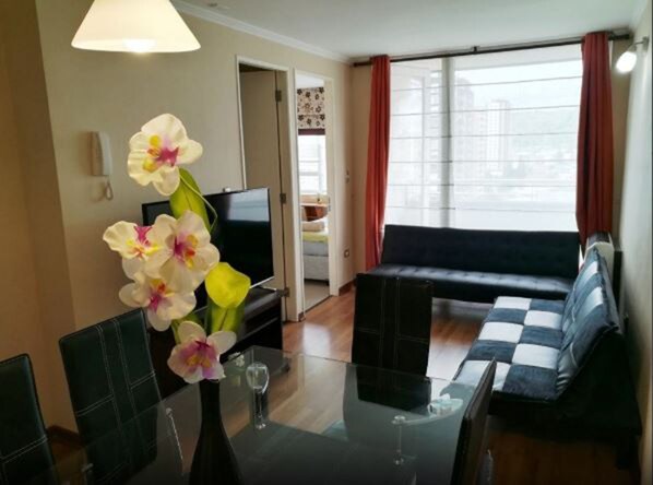 Family Apartment, 2 Bedrooms, Non Smoking, Private Bathroom | Living area | Flat-screen TV - Departamento Caburgua Temuco (Temuco)