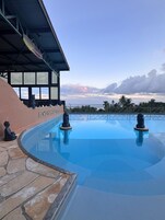 Outdoor pool, open 8:30 AM to 7:00 PM, pool umbrellas, sun loungers