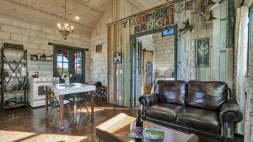 The Grapetown Gasthaus | Living area | 32-inch flat-screen TV with satellite channels, TV