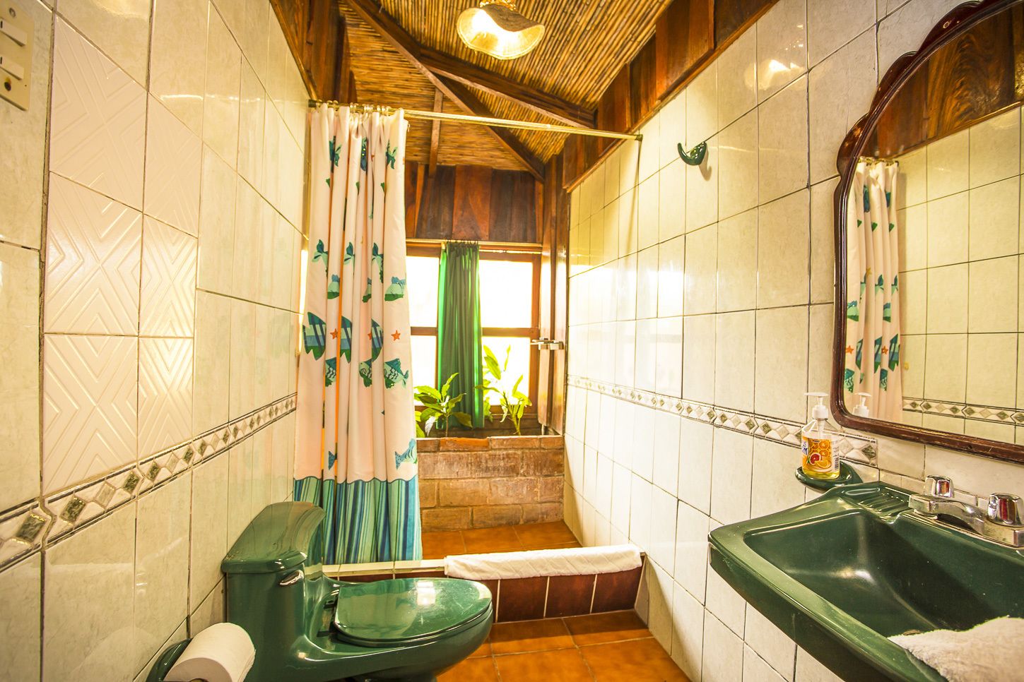 Deluxe Quadruple Room, 2 Queen Beds, Non Smoking | Bathroom | Shower, towels
