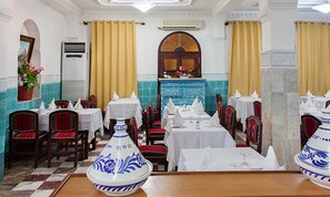 Breakfast, lunch, dinner served; local and international cuisine 