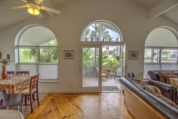 French Doors open onto the Lush, Shady Back Porch.
