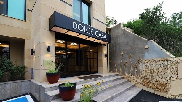 A modern building with a sign reading "DOLCE CASA". - Namyangju Bukhangang Dolce Casa Hotel (Namyangju)