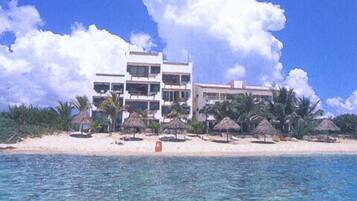 On the beach, sun-loungers, beach towels