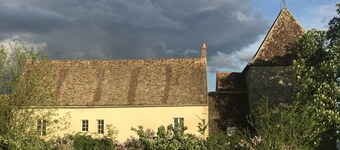 Fortified manor with fields as far as the eye can see