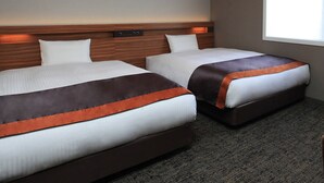 A hotel room with two beds, a wooden headboard, a small artwork on the wall, and a window with daylight. - Urban Hotel Kyoto Shijo Premium (Kyoto)