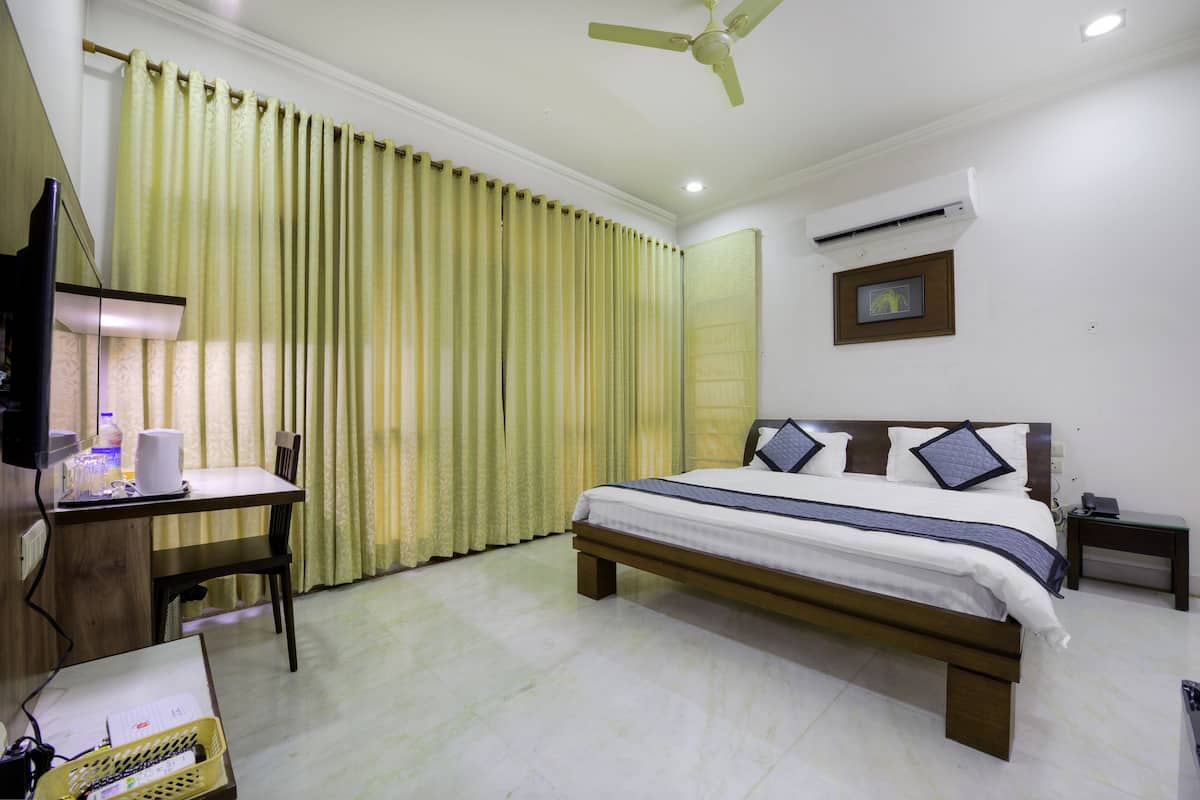 Standard-Vierbettzimmer, 1 Schlafzimmer, Nichtraucher, Gemeinschaftsbad | 2 Schlafzimmer, Zimmersafe, individuell dekoriert