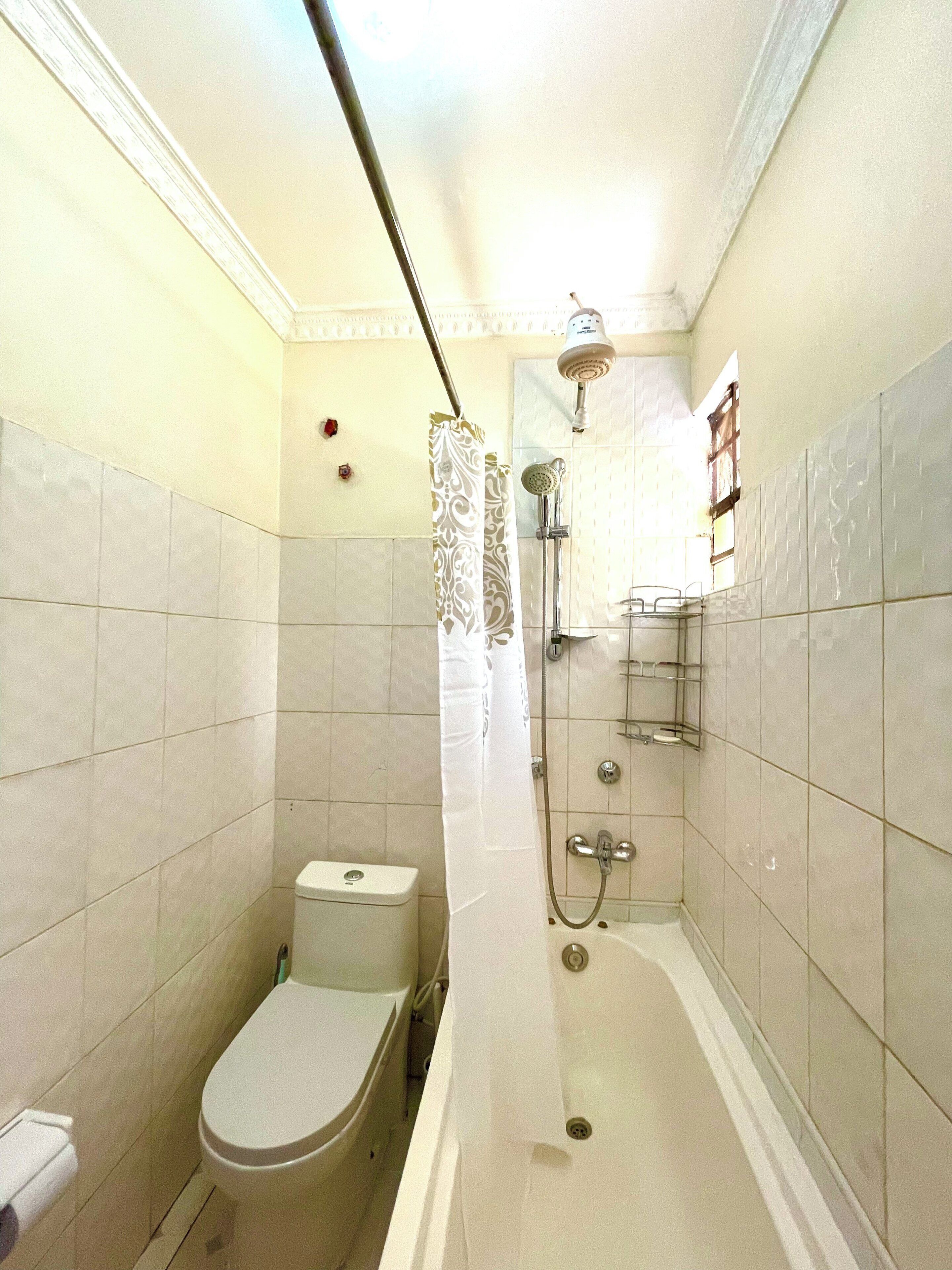 Combined shower/tub, hair dryer, towels, soap