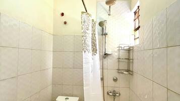 Combined shower/tub, hair dryer, towels, soap