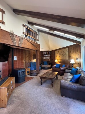 Smart TV, fireplace, DVD player, foosball