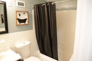 Combined shower/tub, hair dryer, towels, soap
