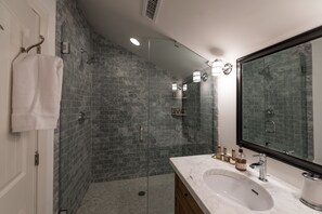 Shower, hair dryer, towels, soap