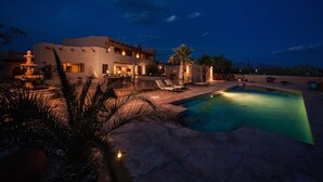 A modern house with a pool, outdoor seating, and a fountain. - Hacienda near Ritz Carlton 360 views on 5 ac, all bdrms ensuite bathrms (Marana)