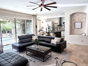 Smart TV, fireplace, books, offices