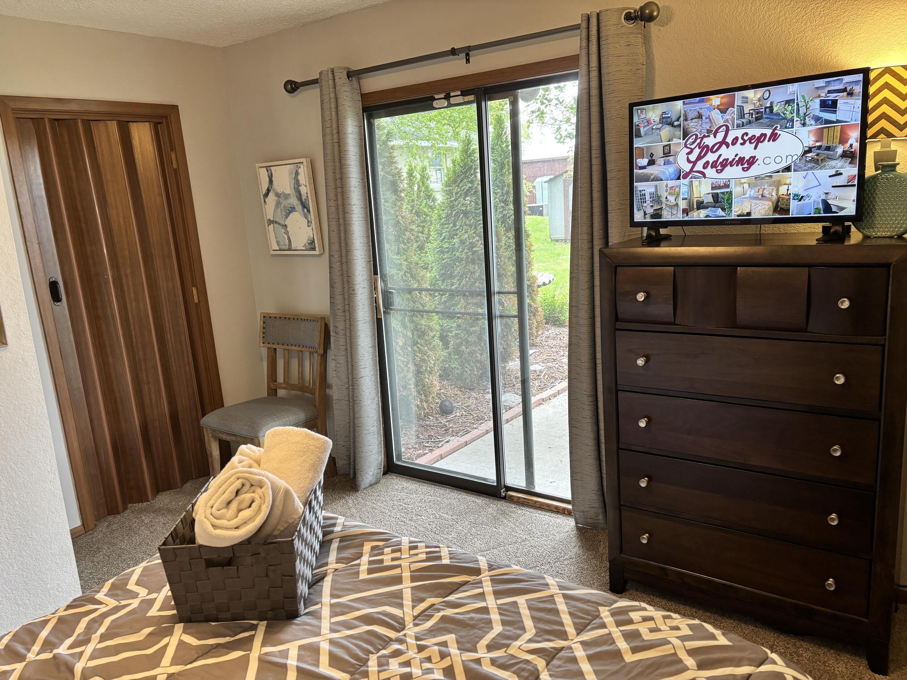 1 bedroom, desk, iron/ironing board, travel crib