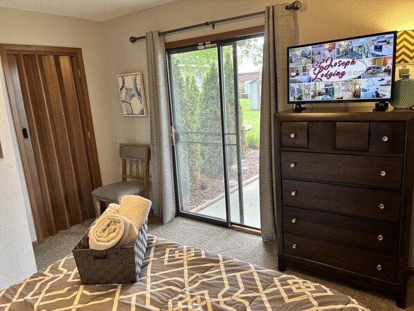 1 bedroom, desk, iron/ironing board, travel crib