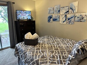 1 bedroom, desk, iron/ironing board, travel crib