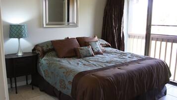 1 bedroom, desk, iron/ironing board, travel crib