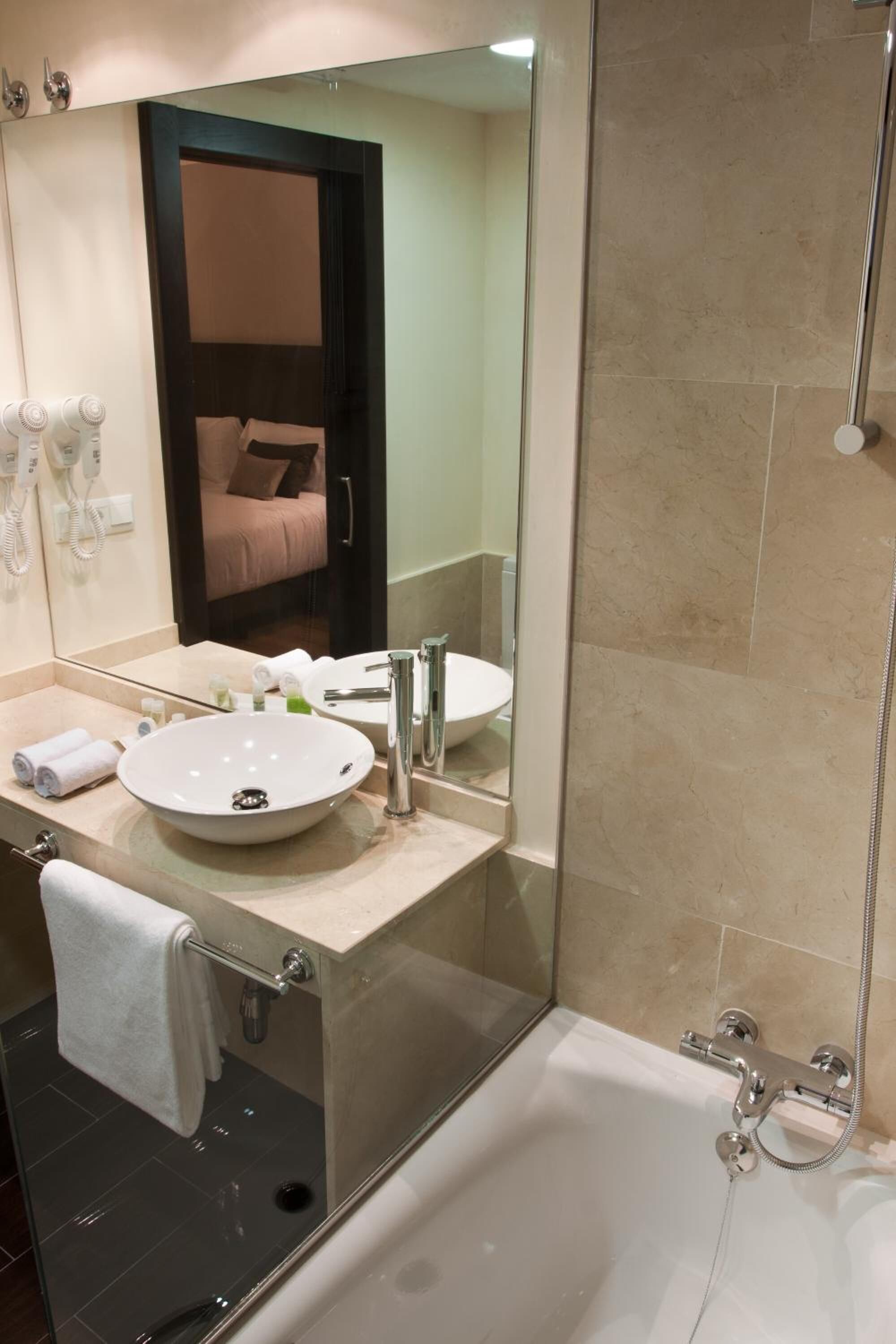 hair dryer, bidet, towels, soap