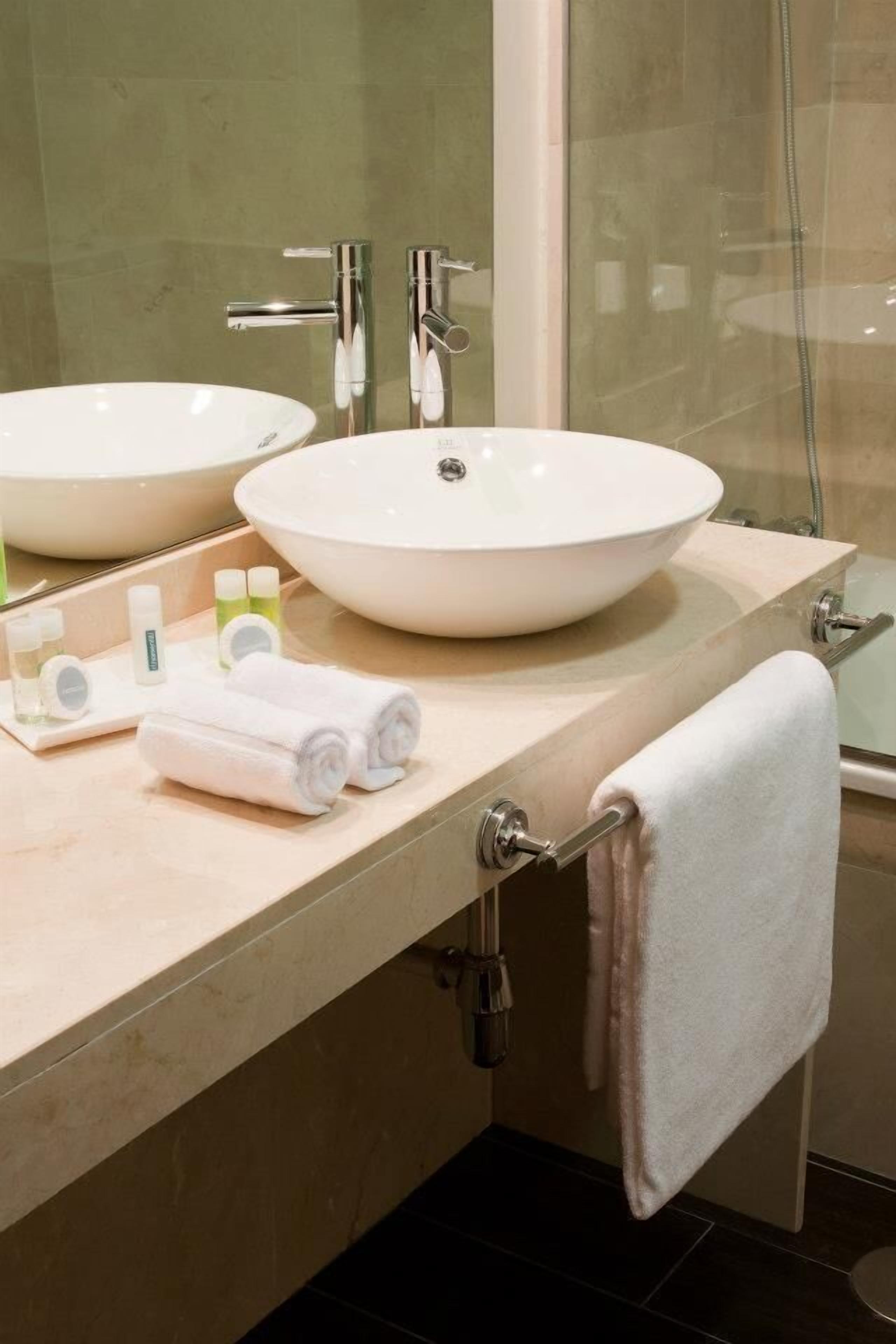 hair dryer, bidet, towels, soap