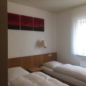 Down duvets, desk, blackout curtains, iron/ironing board