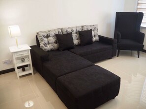 Condo, 1 Bedroom | Living room | 45-inch LED TV with cable channels, TV - Amazing Marina Residential Suites (Manila)