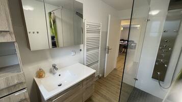 Hair dryer, towels, soap, toilet paper