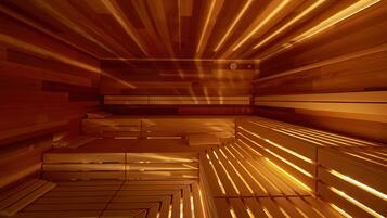 A sauna with wooden benches and slatted walls.