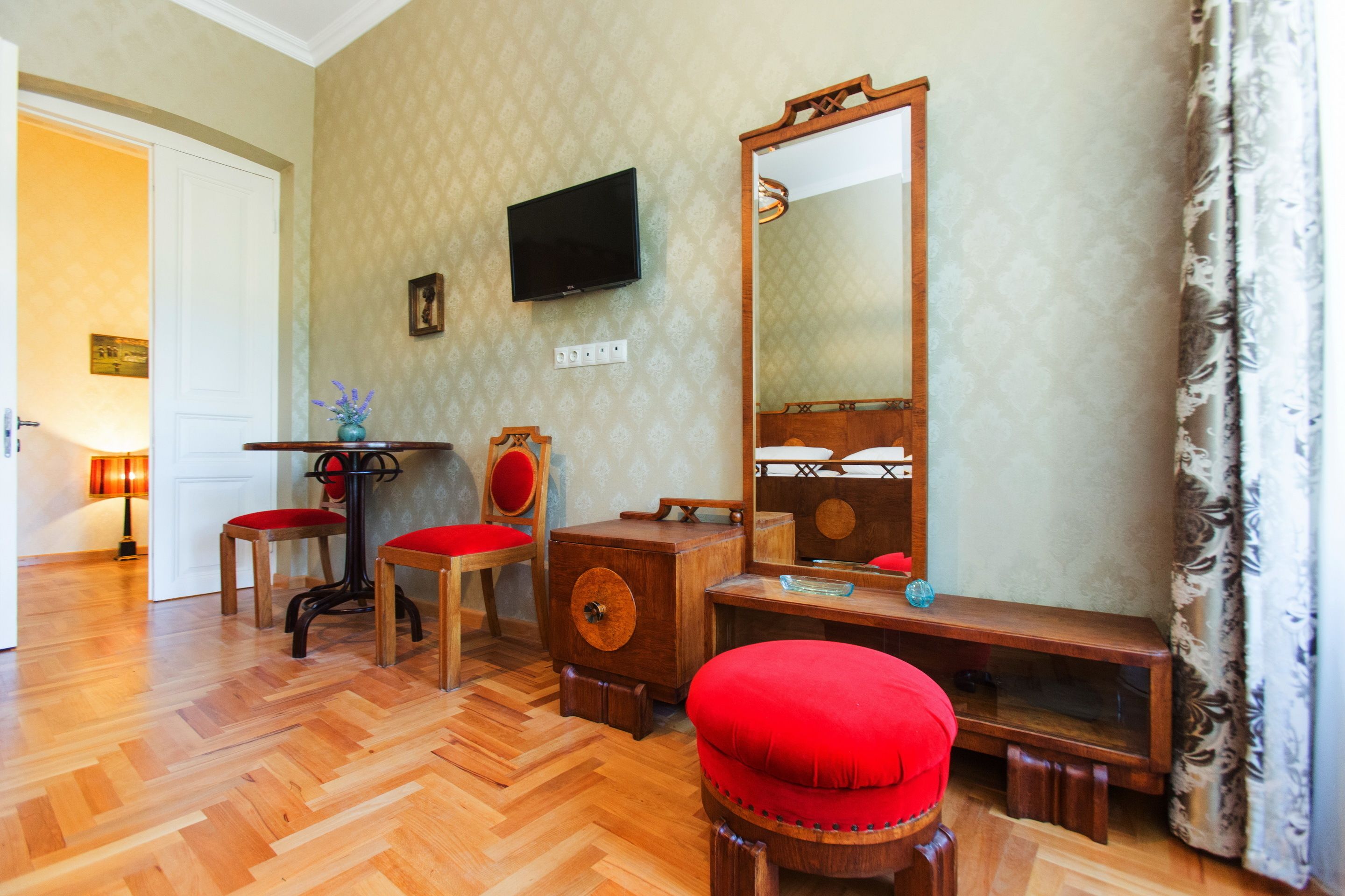 Deluxe Double Room | Living area | Flat-screen TV