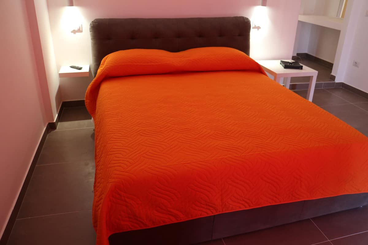 Exclusive Triple Room, Ensuite, City View | Minibar, desk, blackout drapes, soundproofing