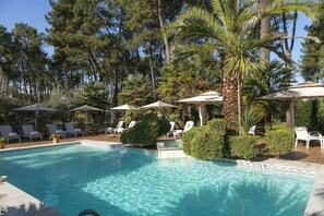 Indoor pool, outdoor pool, open 8:00 AM to 8:00 PM, pool umbrellas